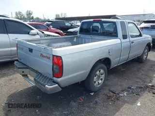 2000 Nissan Frontier XE z VIN 1N6DD26S9YC305451, wystawiony jako IAAI lot #41928123 z przebiegiem Nie podano mil oraz . Historia ofert i sprzedaży dostępna na DreamBid. Obrazek 4.