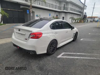 2016 Subaru WRX STI Limited z VIN JF1VA2Z66G9810377, wystawiony jako Copart lot #57713155 z przebiegiem 125 625 mil mil oraz Tytuł czysty. Historia ofert i sprzedaży dostępna na DreamBid. Obrazek 4.