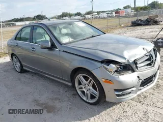 2014 Mercedes-Benz C-Class C 250 Sport with VIN WDDGF4HBXEG239554, listed as a IAAI auction lot 40985936 with 182,701 mi miles. Bid and sale history available at carsss.com. Image 1.