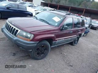 2001 Jeep Grand Cherokee Laredo z VIN 1J4GX48S41C585151, wystawiony jako IAAI lot #41020660 z przebiegiem Nie podano mil oraz . Historia ofert i sprzedaży dostępna na DreamBid. Obrazek 2.