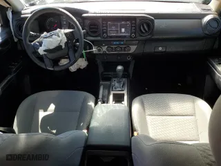 2021 Toyota Tacoma 4WD SR with VIN 5TFCZ5AN6MX252195, listed as a Copart auction lot 48234085 with 56,983 mi miles and Salvage Title. Bid and sale history available at carsss.com. Image 8.