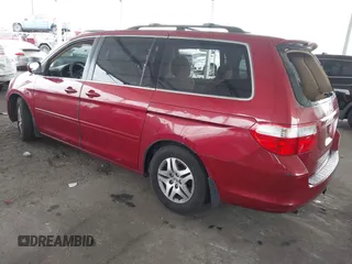 2005 Honda Odyssey EX with VIN 5FNRL38485B411954, listed as a IAAI auction lot 42039034 with 220,966 mi miles. Bid and sale history available at carsss.com. Image 3.