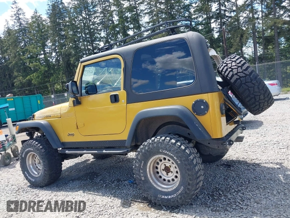 2003 Jeep Wrangler Rubicon with VIN 1J4FA69S93P302102, listed as a IAAI auction lot 42312951 with 146,408 mi miles and . Bid and sale history available at DreamBid. Image 14.