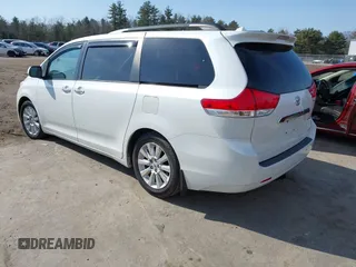 2011 Toyota Sienna XLE AAS with VIN 5TDYK3DC7BS054012, listed as a IAAI auction lot 41752182 with 123,226 mi miles and . Bid and sale history available at DreamBid. Image 3.