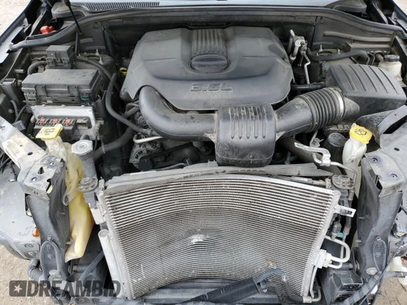2011 Jeep Grand Cherokee Overland with VIN 1J4RS6GG1BC636963, listed as a Copart auction lot 87654425 with 189,736 mi miles and Salvage Title. Bid and sale history available at DreamBid. Image 13.