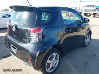 2012 Scion iQ with VIN JTNJJXB02CJ018324, listed as a IAAI auction lot 41692406 with 162,445 mi miles. Bid and sale history available at carsss.com. Image 4.