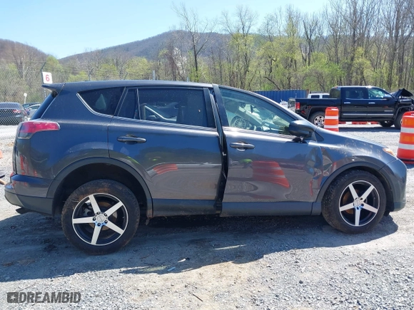 2018 Toyota RAV4 LE with VIN JTMBFREV0JJ722483, listed as a IAAI auction lot 41982973 with 83,012 mi miles. Bid and sale history available at carsss.com. Image 13.