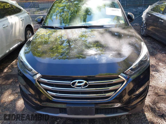 2016 Hyundai Tucson Limited with VIN KM8J33A28GU259038, listed as a IAAI auction lot 42200578 with 109,109 mi miles. Bid and sale history available at carsss.com. Image 6.