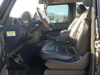 2009 Mercedes-Benz G with VIN WDCYR37E59X179789, listed as a Copart auction lot 48282934 with 154,393 mi miles and Salvage Title. Bid and sale history available at DreamBid. Image 7.