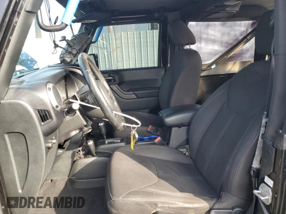 2017 Jeep Wrangler Sport with VIN 1C4GJWAG9HL576707, listed as a Copart auction lot 43285955 with 113,692 mi miles and Salvage Title. Bid and sale history available at DreamBid. Image 7.