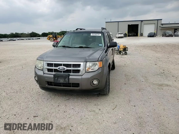 2010 Ford Escape XLT с VIN 1FMCU0D72AKD21676, выставлен на аукционе Copart как лот 55268255 с пробегом 172 355 миль миль и Списание • Salvage title. История ставок и продаж доступна на DreamBid. Изображение 13.