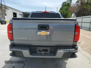 2018 Chevrolet Colorado 2WD LT with VIN 1GCGSCEN6J1143433, listed as a Copart auction lot 56942765 with 115,450 mi miles and Salvage title. Bid and sale history available at DreamBid. Image 6.