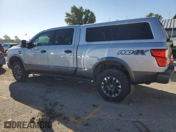 2016 Nissan Titan XD PRO-4X with VIN 1N6BA1F4XGN509643, listed as a Copart auction lot 74530434 with 83,734 mi miles and Clean Title. Bid and sale history available at carsss.com. Image 2.