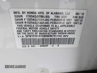 2013 Honda Pilot Touring with VIN 5FNYF4H97DB069979, listed as a IAAI auction lot 42133922 with 276,574 mi miles and . Bid and sale history available at carsss.com. Image 9.