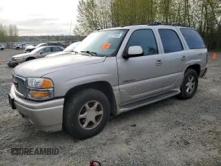 2005 GMC Yukon Denali z VIN 1GKEK63U65J262371, wystawiony jako Copart lot #52773425 z przebiegiem 129 028 mil mil oraz Czysty tytuł • Clean title. Historia ofert i sprzedaży dostępna na DreamBid. Obrazek 1.