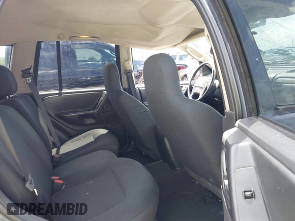 2004 Jeep Grand Cherokee Laredo with VIN 1J4GX48S44C205469, listed as a IAAI auction lot 42310571 with 154,929 mi miles and . Bid and sale history available at DreamBid. Image 8.