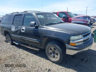 2003 Chevrolet Suburban LS z VIN 3GNEC16TX3G312371, wystawiony jako IAAI lot #41208355 z przebiegiem 199 436 mil mil oraz . Historia ofert i sprzedaży dostępna na DreamBid. Obrazek 1.