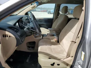 2014 Dodge Grand Caravan SXT with VIN 2C4RDGCG2ER273533, listed as a Copart auction lot 49228495 with 124,070 mi miles and Salvage Title. Bid and sale history available at DreamBid. Image 7.