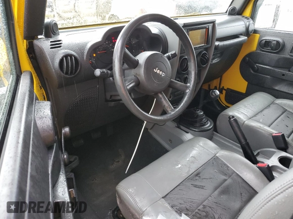 2009 Jeep Wrangler X с VIN 1J4FA24169L775219, выставлен на аукционе Copart как лот 71110304 с пробегом 132 886 миль миль и Списание • Salvage title. История ставок и продаж доступна на DreamBid. Изображение 8.