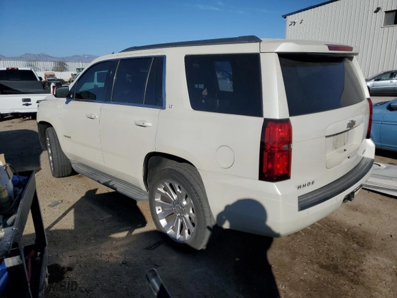 2015 Chevrolet Tahoe LT with VIN 1GNSCBKC2FR280423, listed as a Copart auction lot 87492524 with 144,648 mi miles and Salvage Title. Bid and sale history available at carsss.com. Image 2.