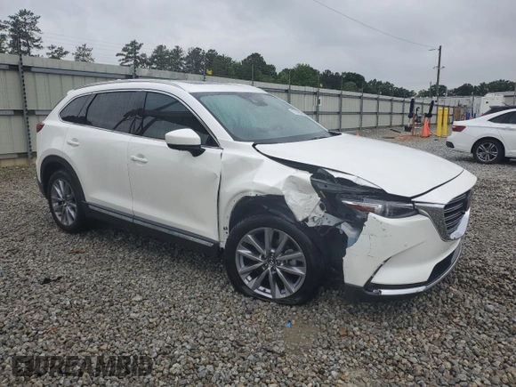 2023 Mazda CX-9 Grand Touring with VIN JM3TCBDY8P0641026, listed as a Copart auction lot 57388665 with 20,033 mi miles and Salvage title. Bid and sale history available at DreamBid. Image 4.