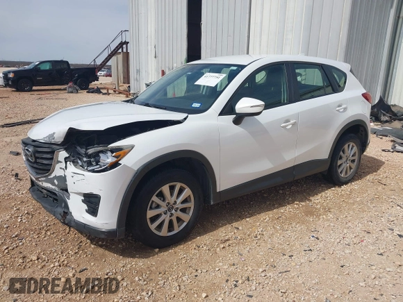 2016 Mazda CX-5 Sport with VIN JM3KE2BYXG0683318, listed as a IAAI auction lot 41777751 with 116,922 mi miles. Bid and sale history available at carsss.com. Image 21.