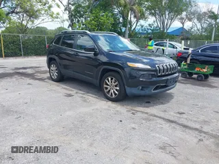 2016 Jeep Cherokee Limited z VIN 1C4PJMDB4GW151834, wystawiony jako IAAI lot #42311409 z przebiegiem 159 743 mil mil oraz . Historia ofert i sprzedaży dostępna na DreamBid. Obrazek 1.