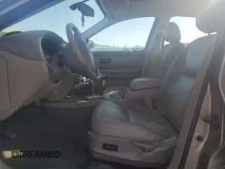 2003 Ford Taurus SEL Deluxe with VIN 1FAFP56S23G221922, listed as a Copart auction lot 79673294 with 142,911 mi miles and Salvage Title. Bid and sale history available at DreamBid. Image 7.