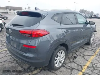 2019 Hyundai Tucson Value with VIN KM8J33A49KU071977, listed as a IAAI auction lot 41515460 with 24,701 mi miles. Bid and sale history available at carsss.com. Image 4.