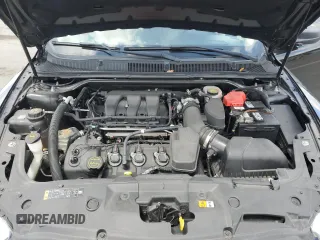2015 Ford Taurus SE with VIN 1FAHP2D86FG140750, listed as a Copart auction lot 54390145 with 128,163 mi miles and Salvage Title. Bid and sale history available at carsss.com. Image 11.