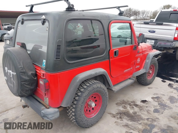 1998 Jeep Wrangler SE with VIN 1J4FY29P2WP791317, listed as a IAAI auction lot 41748523 with 169,052 mi miles. Bid and sale history available at carsss.com. Image 4.