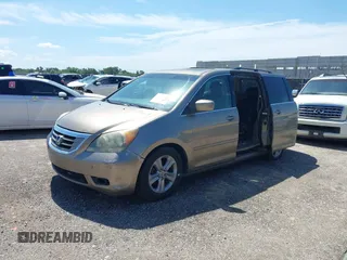 2010 Honda Odyssey Touring с VIN 5FNRL3H93AB069531, выставлен на аукционе IAAI как лот 42462835 с пробегом 241 297 миль миль и . История ставок и продаж доступна на DreamBid. Изображение 2.
