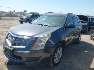 2012 Cadillac SRX with VIN 3GYFNGE32CS546815, listed as a IAAI auction lot 42014765 with 142,373 mi miles. Bid and sale history available at carsss.com. Image 2.