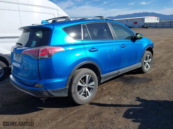 2017 Toyota RAV4 XLE with VIN JTMWFREV4HJ143945, listed as a IAAI auction lot 41901482 with 129,570 mi miles. Bid and sale history available at carsss.com. Image 4.