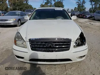 2005 Infiniti Q45 z VIN JNKBF01A85M100070, wystawiony jako Copart lot #82127494 z przebiegiem 176 578 mil mil oraz Szkoda całkowita • Salvage title. Historia ofert i sprzedaży dostępna na DreamBid. Obrazek 5.