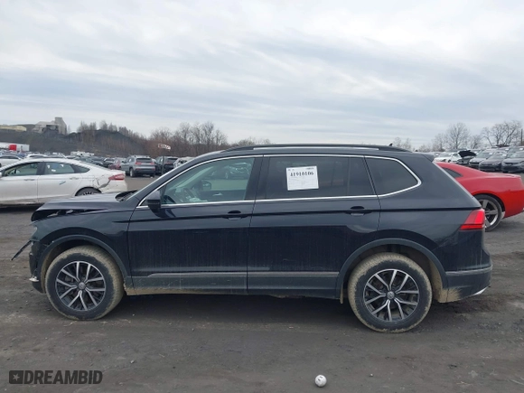 2021 Volkswagen Tiguan SE with VIN 3VV2B7AX0MM049291, listed as a IAAI auction lot 41910106 with 68,468 mi miles. Bid and sale history available at carsss.com. Image 14.