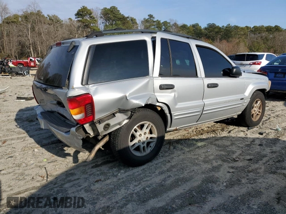 2004 Jeep Grand Cherokee Laredo z VIN 1J4GW48S84C200617, wystawiony jako Copart lot #51732045 z przebiegiem 171 452 mil mil oraz Nie do naprawy • Non repairable. Historia ofert i sprzedaży dostępna na DreamBid. Obrazek 3.
