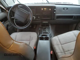 1996 Jeep Cherokee Sport with VIN 1J4FJ68S9TL284984, listed as a Copart auction lot 86307644 with 136,142 mi miles and Salvage Title. Bid and sale history available at carsss.com. Image 8.