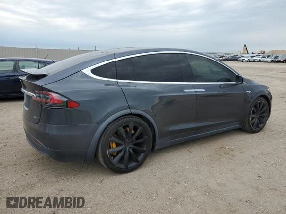 2016 Tesla Model X 70D z VIN 5YJXCAE29GF006512, wystawiony jako Copart lot #57517885 z przebiegiem Nie podano mil oraz Szkoda całkowita • Salvage title. Historia ofert i sprzedaży dostępna na DreamBid. Obrazek 3.