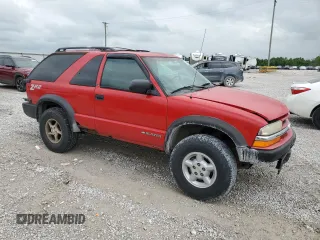 1999 Chevrolet Blazer LS с VIN 1GNCT18W3XK150385, выставлен на аукционе Copart как лот 58490985 с пробегом 262 007 миль миль и Списание • Salvage title. История ставок и продаж доступна на DreamBid. Изображение 4.