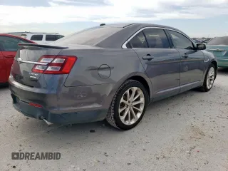 2013 Ford Taurus Limited z VIN 1FAHP2F89DG187913, wystawiony jako Copart lot #57096865 z przebiegiem 93 575 mil mil oraz Szkoda całkowita • Salvage title. Historia ofert i sprzedaży dostępna na DreamBid. Obrazek 3.