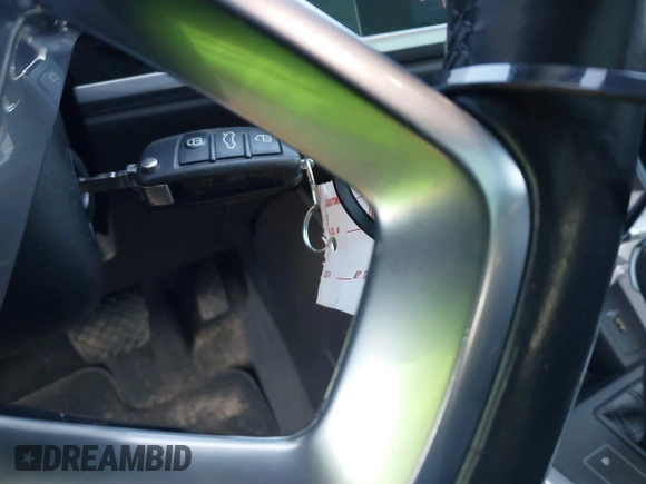 2021 Audi Q3 Premium with VIN WA1AUCF34M1099668, listed as a IAAI auction lot 41990226 with 69,866 mi miles and . Bid and sale history available at DreamBid. Image 11.
