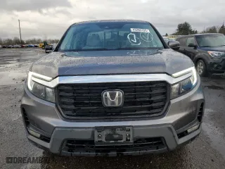 2021 Honda Ridgeline RTL-E with VIN 5FPYK3F74MB015036, listed as a Copart auction lot 43269105 with 64,631 mi miles and Salvage Title. Bid and sale history available at carsss.com. Image 5.