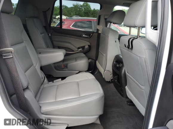 2020 Chevrolet Tahoe LT z VIN 1GNSKBKC7LR301863, wystawiony jako Copart lot #65205365 z przebiegiem 78 866 mil mil oraz Szkoda całkowita • Salvage title. Historia ofert i sprzedaży dostępna na DreamBid. Obrazek 11.