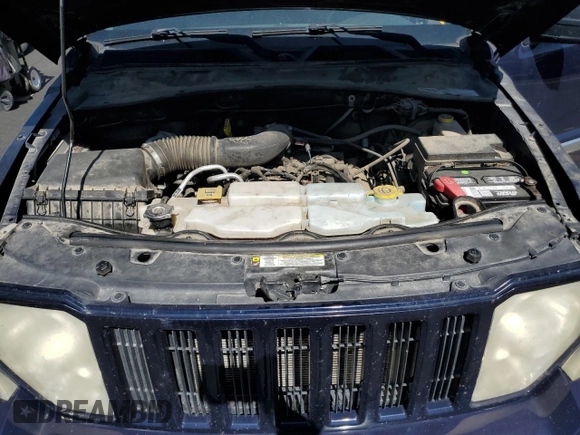 2012 Jeep Liberty Sport with VIN 1C4PJMAK5CW182377, listed as a Copart auction lot 57671345 with 140,236 mi miles and Salvage title. Bid and sale history available at DreamBid. Image 12.