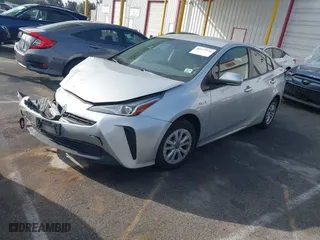 2021 Toyota Prius L Eco with VIN JTDKAMFU8M3135514, listed as a IAAI auction lot 40977114 with 70,451 mi miles. Bid and sale history available at carsss.com. Image 18.