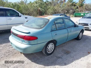 1998 Ford Escort LX with VIN 1FALP13P9WW103307, listed as a IAAI auction lot 40681877 with 1 mi miles. Bid and sale history available at carsss.com. Image 4.