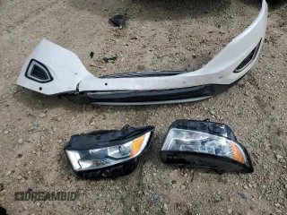 2015 Ford Edge Titanium z VIN 2FMPK3K85FBC05782, wystawiony jako Copart lot #56356595 z przebiegiem 165 202 mil mil oraz Szkoda całkowita • Salvage title. Historia ofert i sprzedaży dostępna na DreamBid. Obrazek 13.