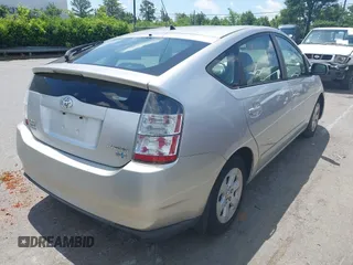 2005 Toyota Prius z VIN JTDKB20UX57051568, wystawiony jako IAAI lot #42318318 z przebiegiem 138 487 mil mil oraz . Historia ofert i sprzedaży dostępna na DreamBid. Obrazek 4.