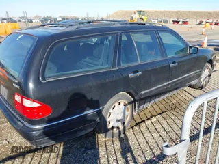 1999 Mercedes-Benz E-Class with VIN WDBJH82F2XX027360, listed as a IAAI auction lot 40977518 with 1 mi miles. Bid and sale history available at carsss.com. Image 4.